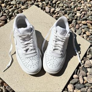 White Nike tennis shoes
